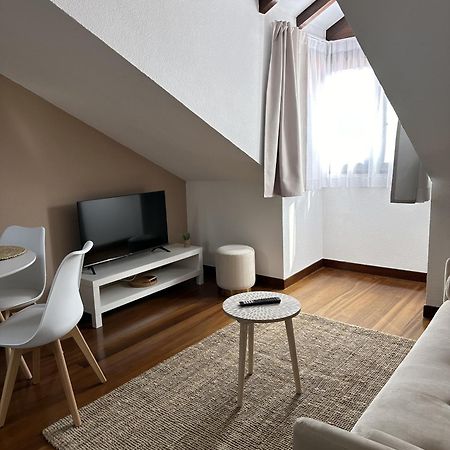 Apartamentos Val De Комильяс Экстерьер фото