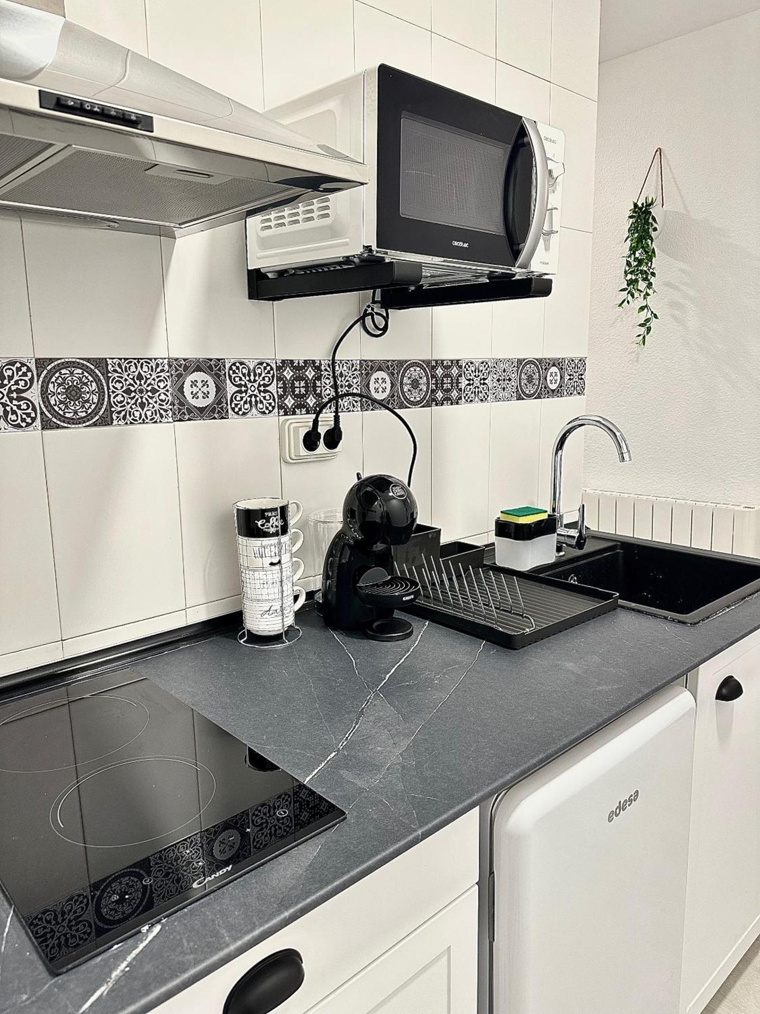 Apartamentos Val De Комильяс Экстерьер фото